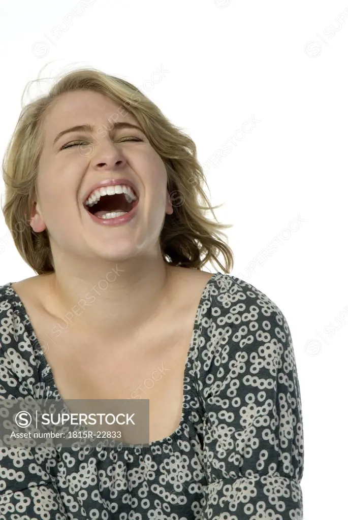 Blonde woman, laughing, portrait