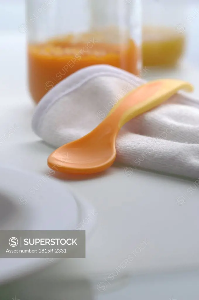 Baby spoon with napkin, close-up