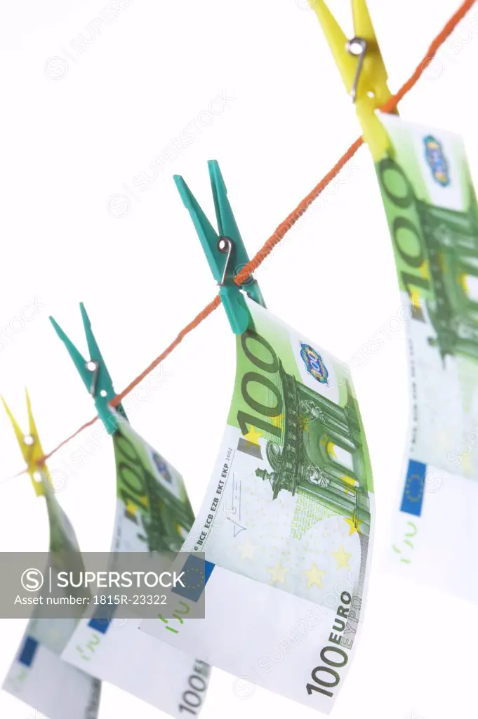 Hundred euro notes on clothesline, close-up
