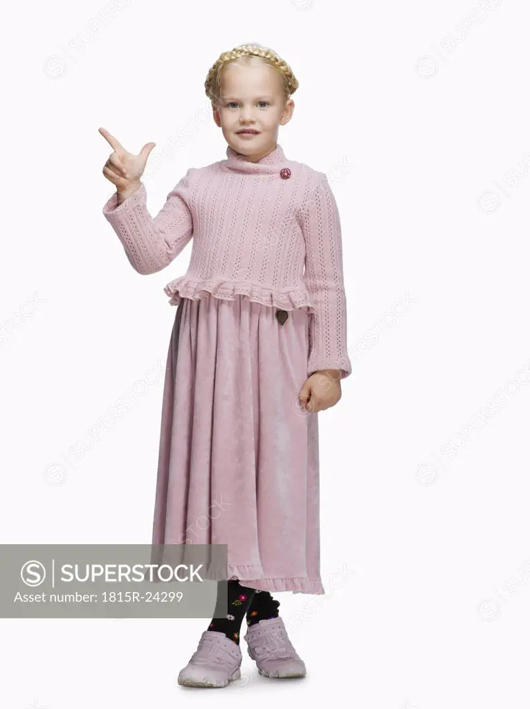 Blond girl (6-8) in a dress, gesturing, portrait