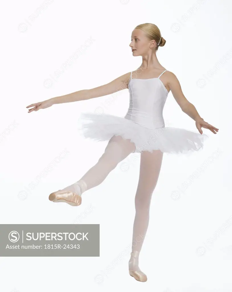 Young ballerina (14-15), dancing, portrait