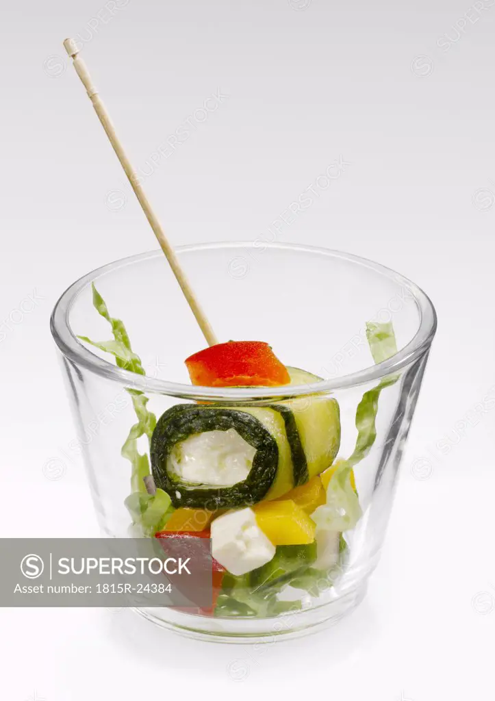 Zucchini stuffed with feta cheese and vegetable in glass