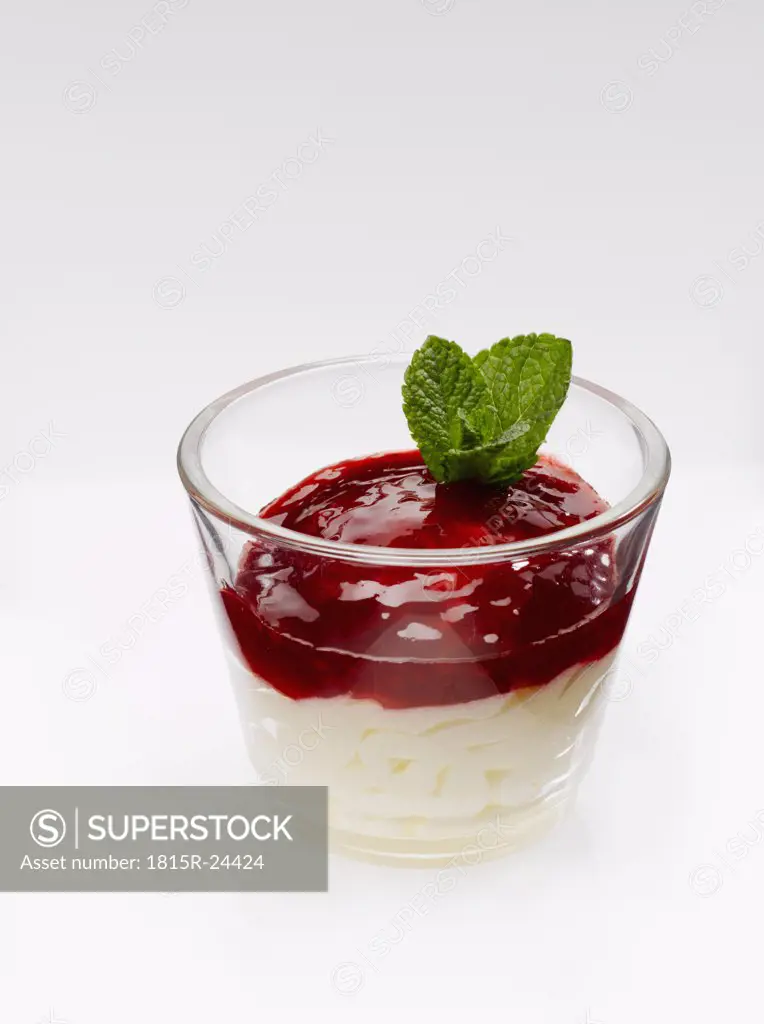 Glass of bavarian cream with raspberry puree
