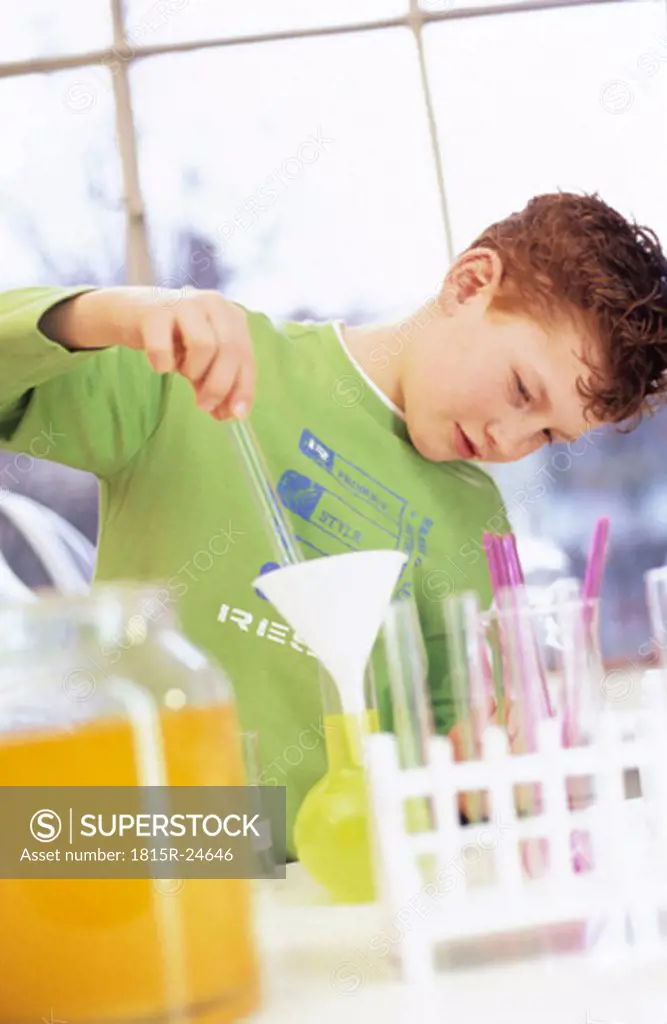 Boy in chemical lab