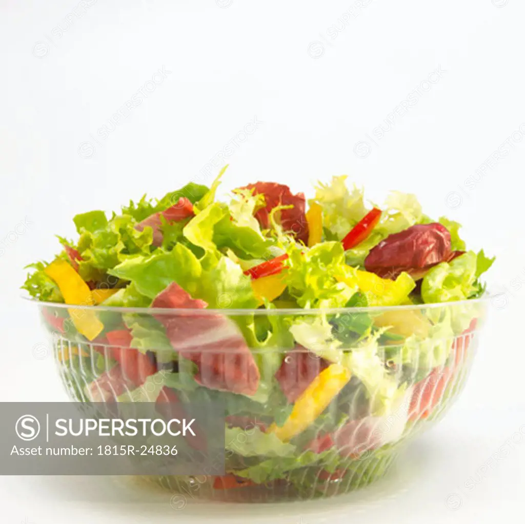 Mixed salad in plastic bin