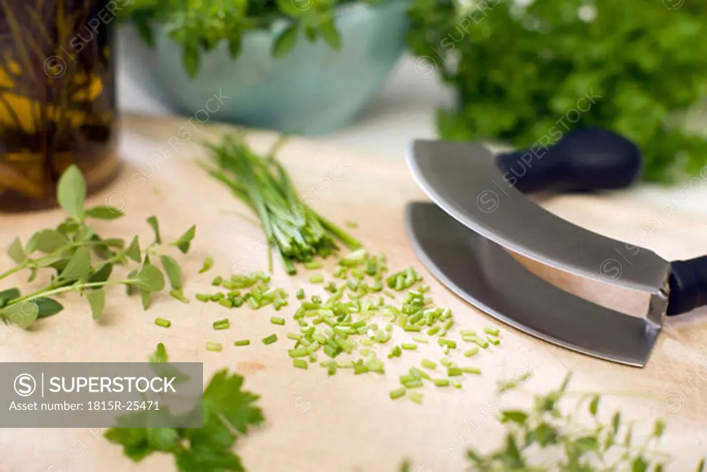 Chopped herbs and herb cutter