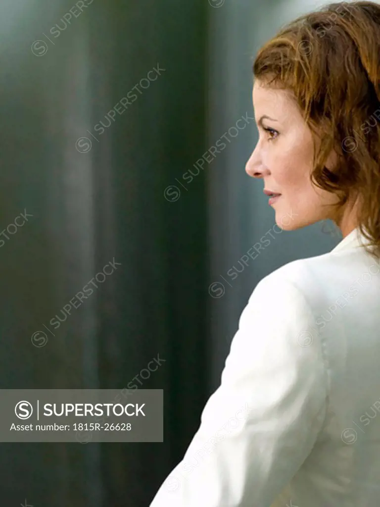 Businesswoman looking away, side view, close-up