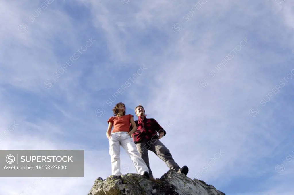 Couple standing on summit