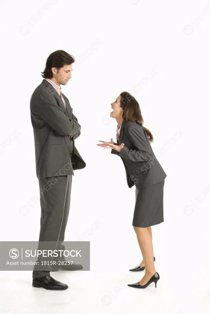 Business woman laughing at business man