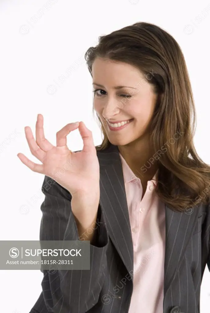 Businesswoman making gesture, close-up