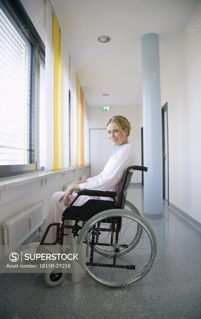 Woman sitting in a wheelchair