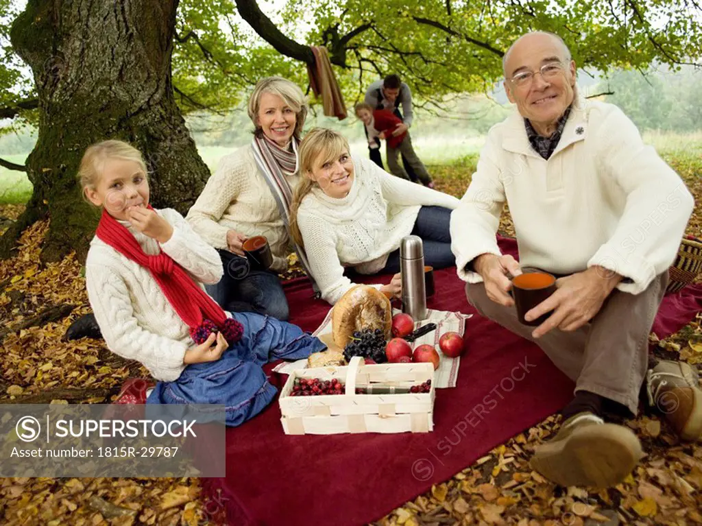Germany, Baden-Württemberg, Swabian mountains, Three generation family having picnic in forest