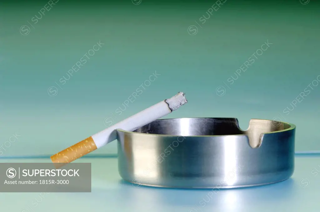 Cigarette in ashtray, close-up