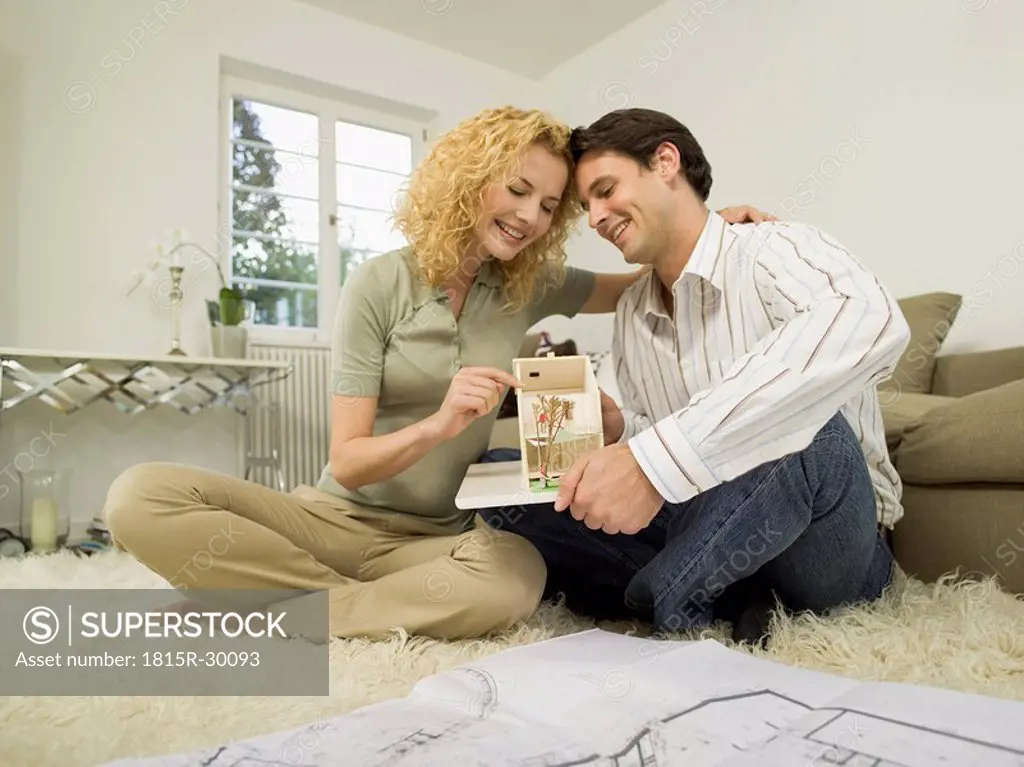 Young couple in living room