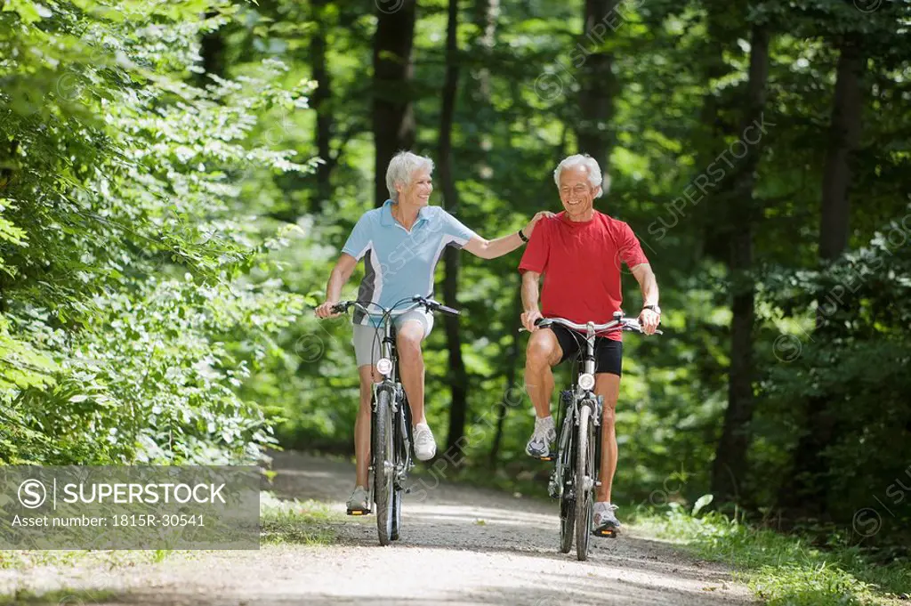 Senior couple biking