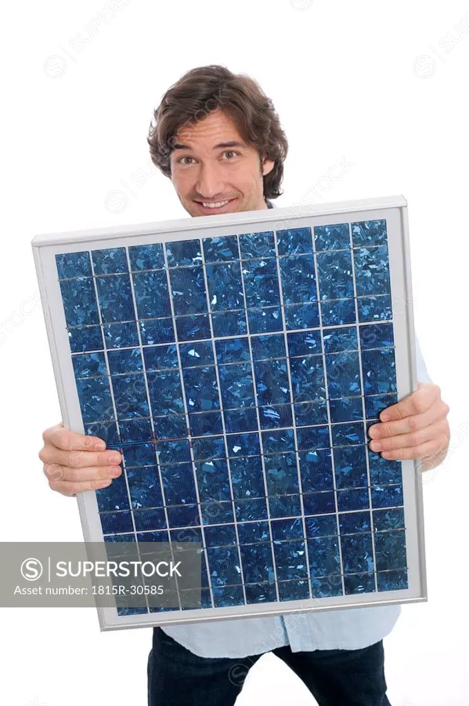 Man holding solar panel