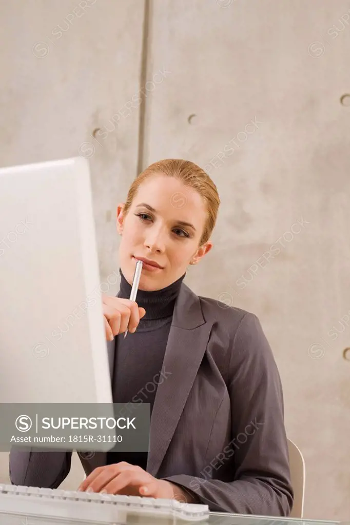 Businesswoman using a computer, portrait