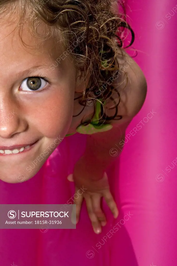 Young girl on air mattress