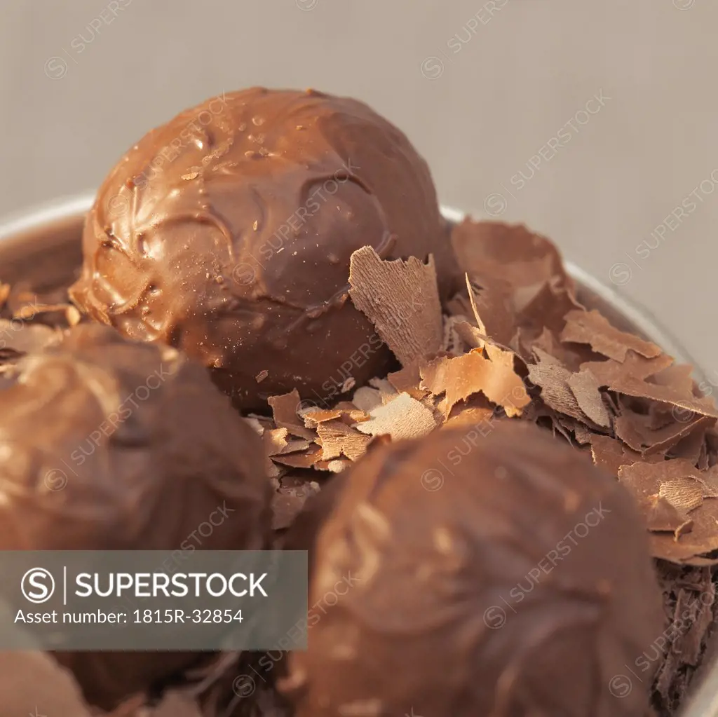 Chocolate truffles in tin box, close-up