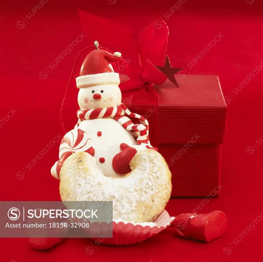 Santa Claus with cookie and Christmas present