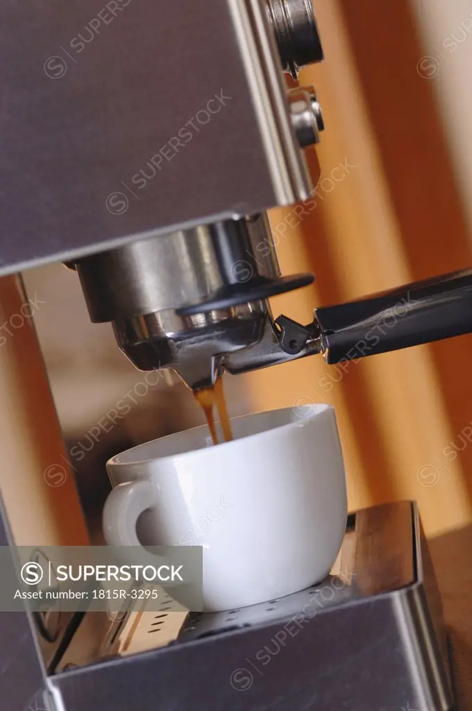 Espresso machine with mug, close-up