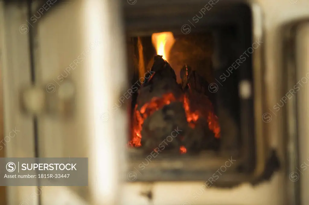 Opened wood stove, close-up