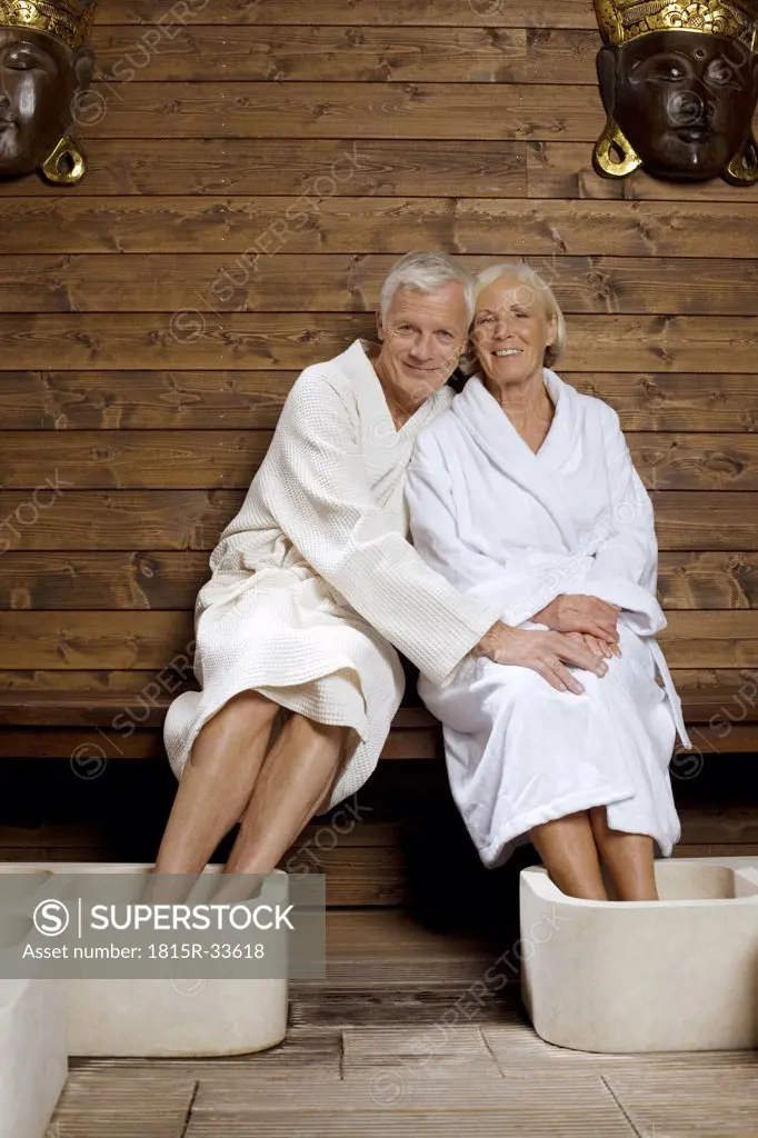 Germany, Senior couple wearing bath robes