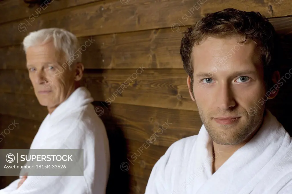 Germany, two men in bathrobe, portrait