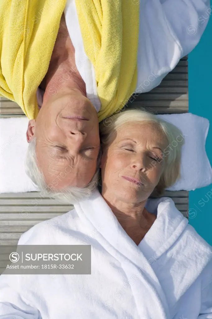 Germany, Senior Couple Relaxing on jetty