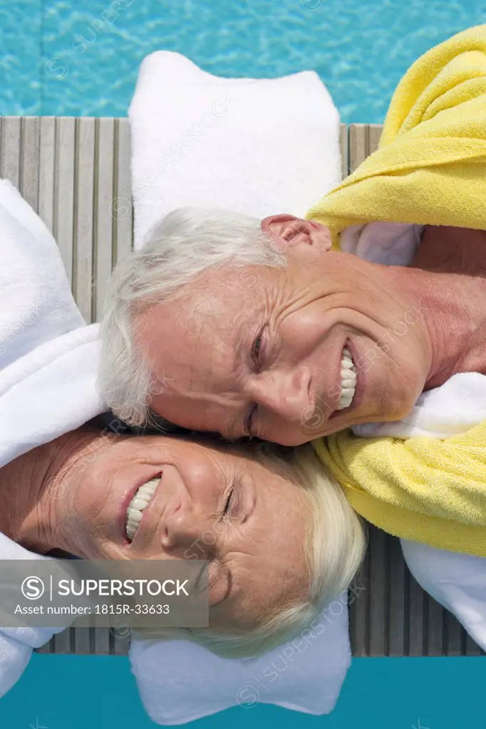 Germany, Senior Couple Relaxing on jetty