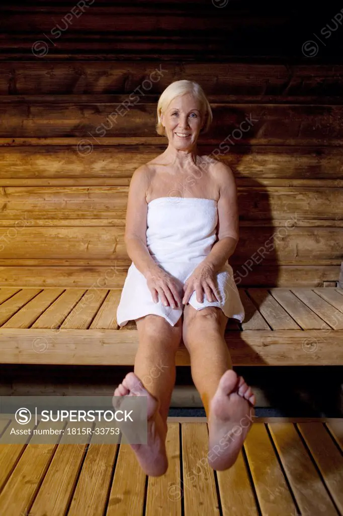 Germany, senior woman in sauna