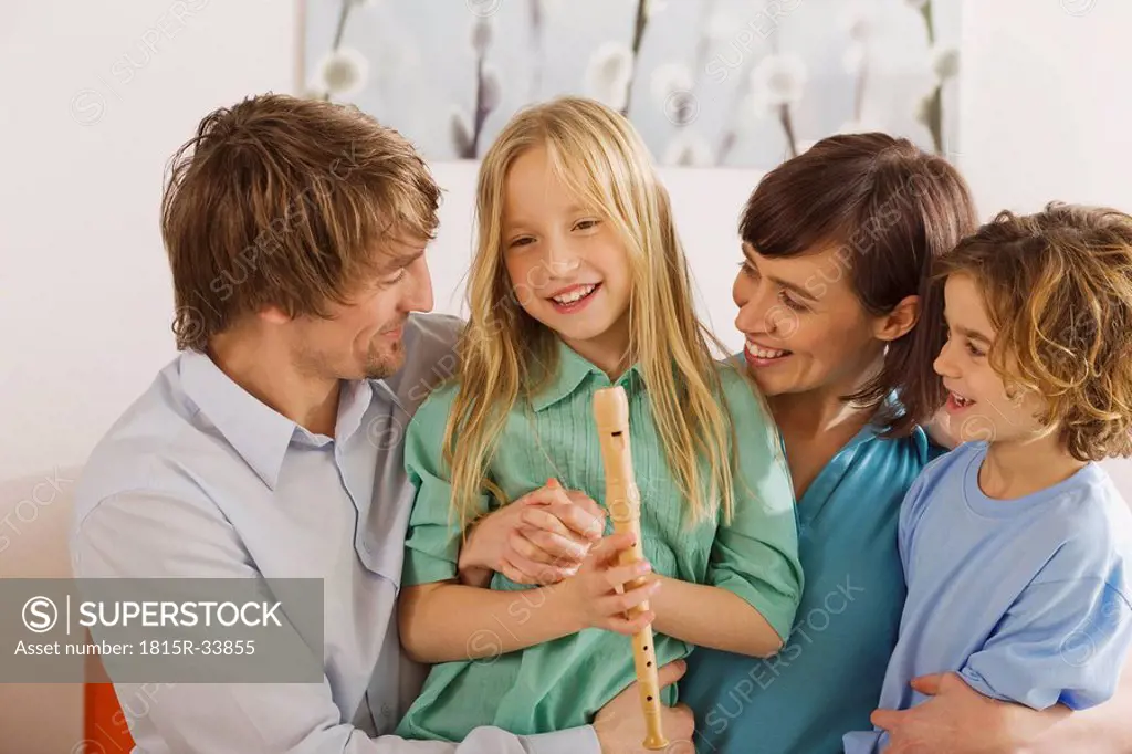 Family in living room, portrait