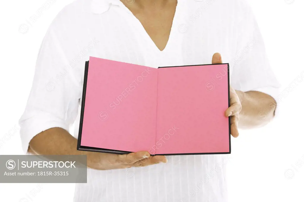 Man holding diary, close-up