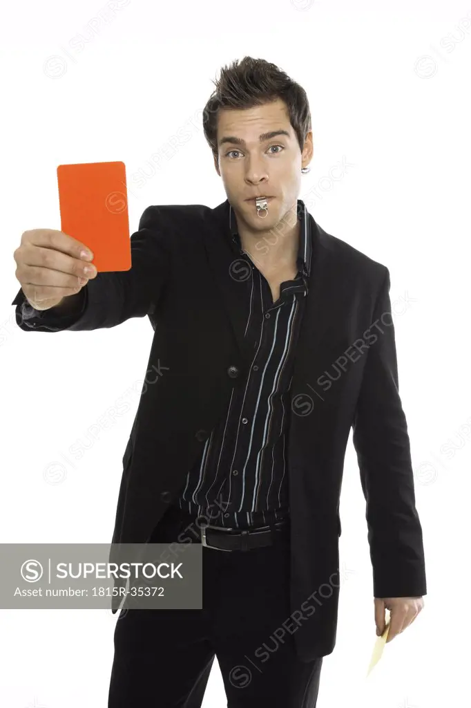 Young man holding red card, close-up