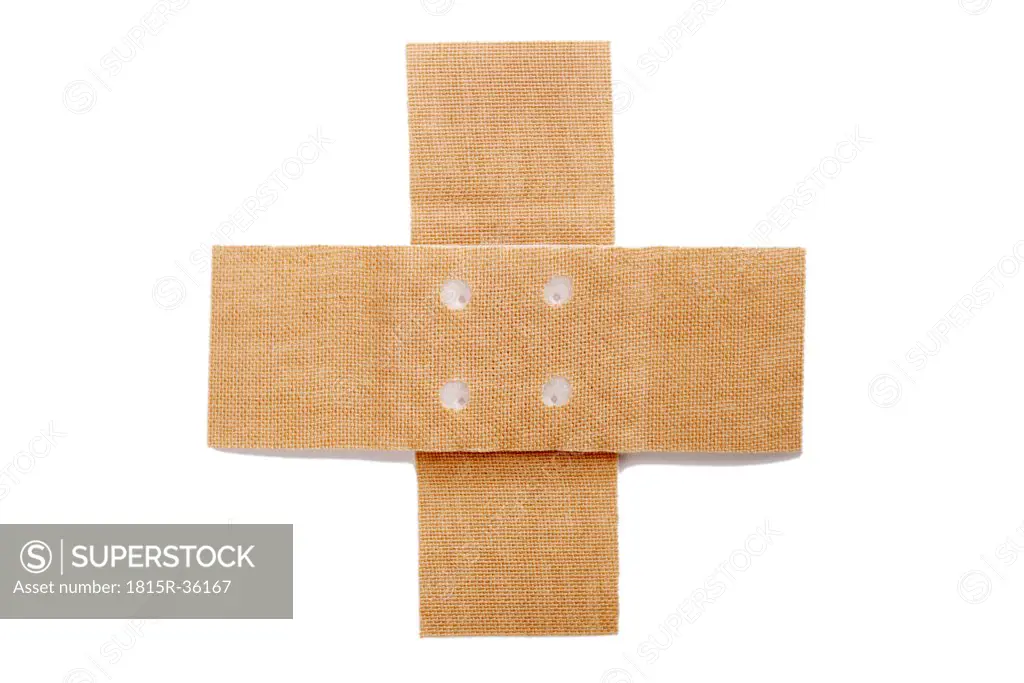Cross adhesive bandages, close-up