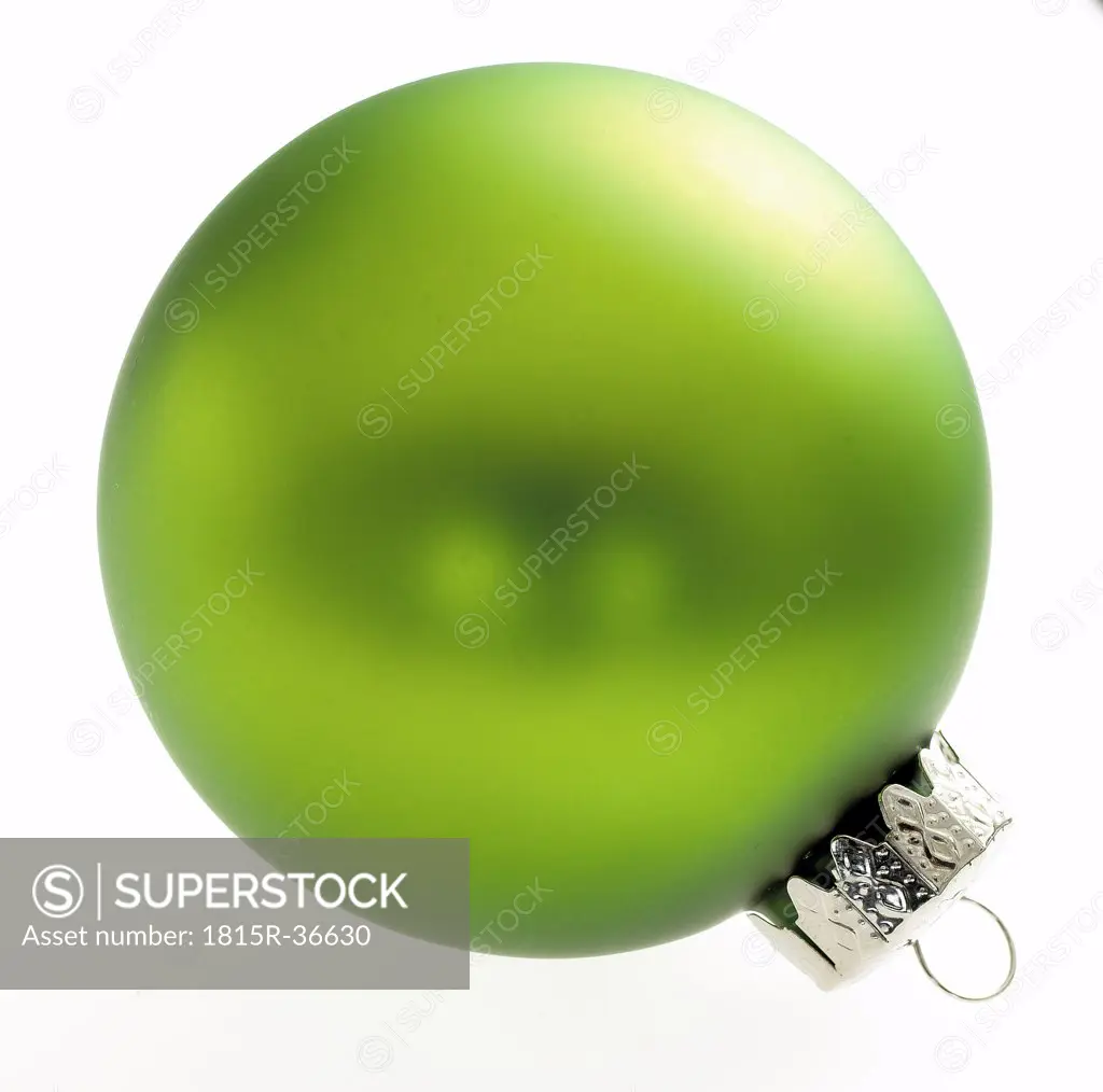 Green Christmas bauble, close-up