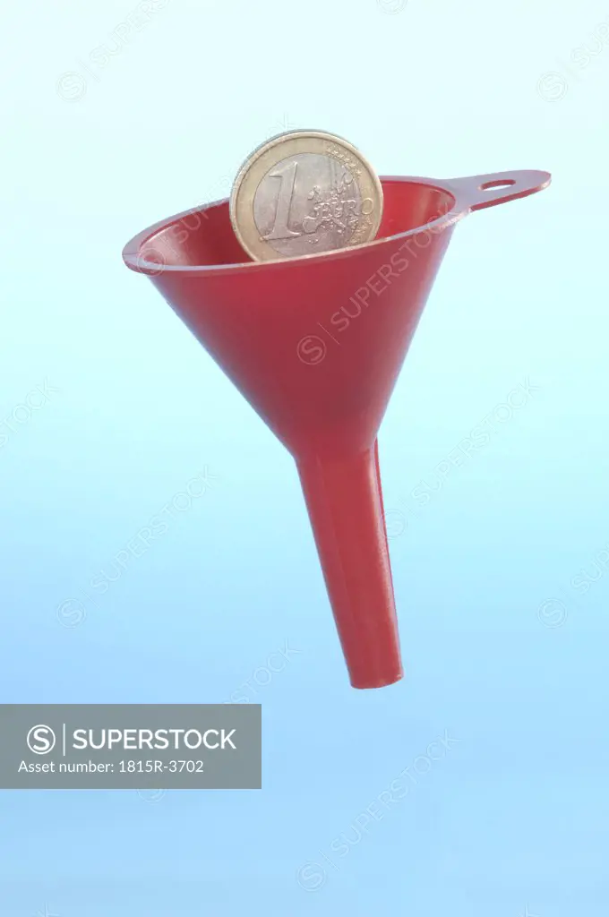 One Euro coin going through funnel