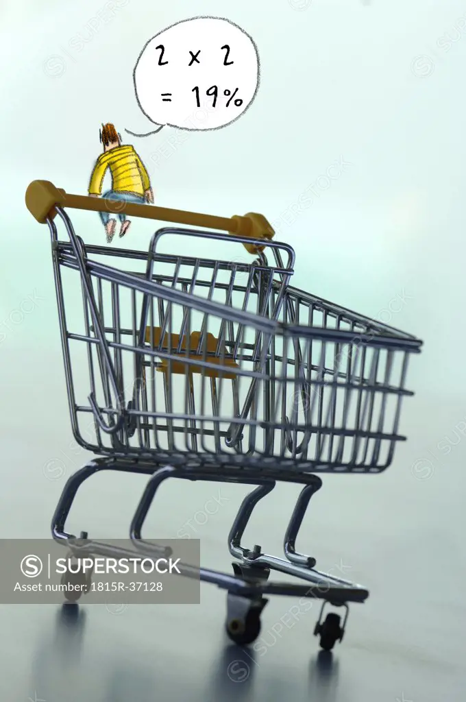 Figurine on shopping cart