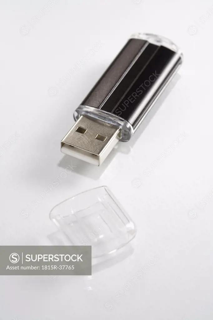 USB flash drive on white background, close-up