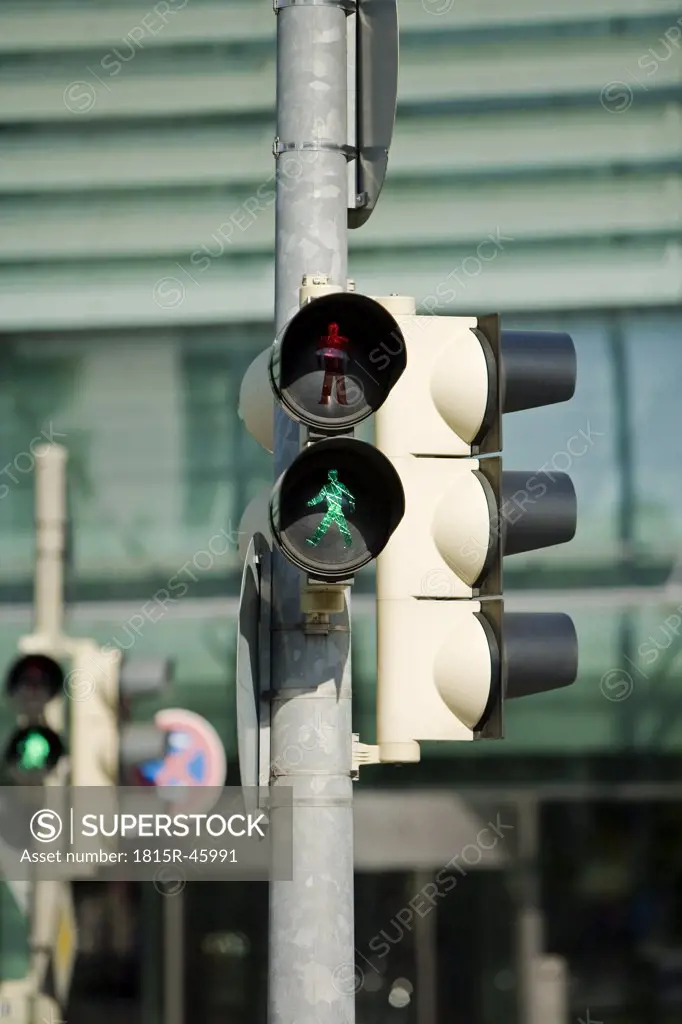 Pedestrian light signalling green, close up