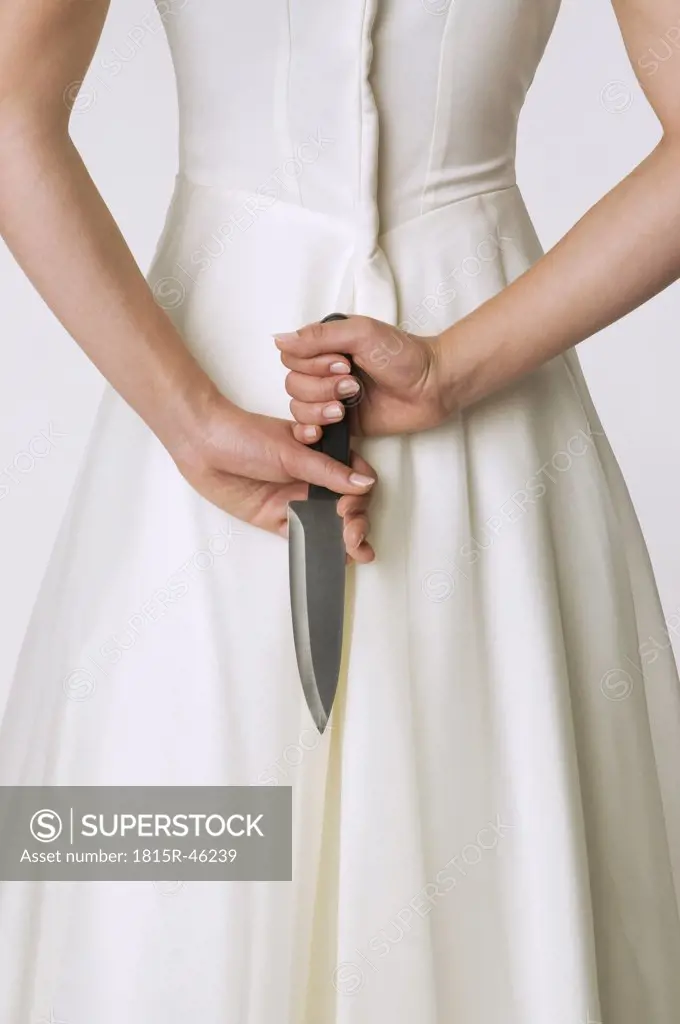 Bride holding knife