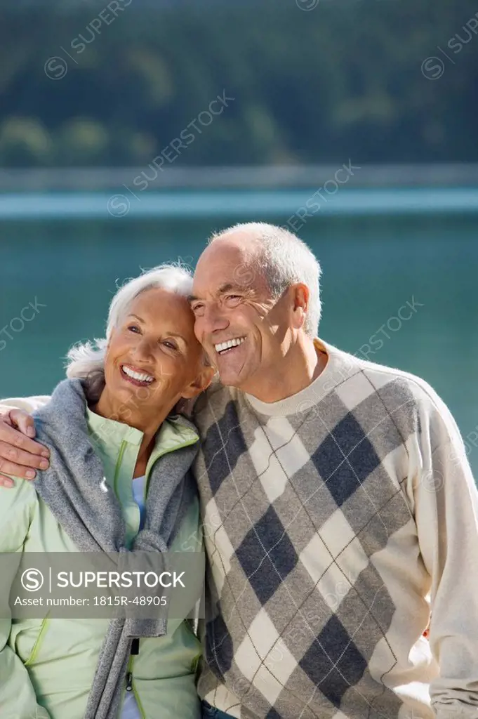 Germany, Bavaria, Walchensee, Senior couple embracing