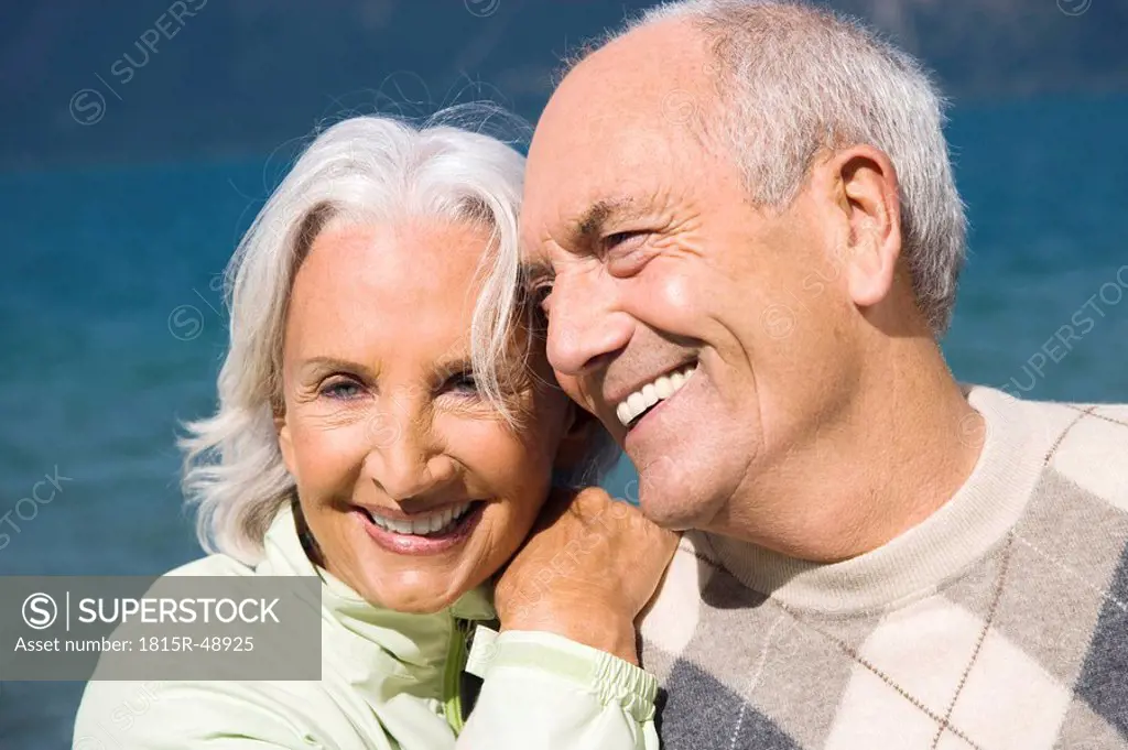 Germany, Bavaria, Walchensee, Senior couple smiling, portrait