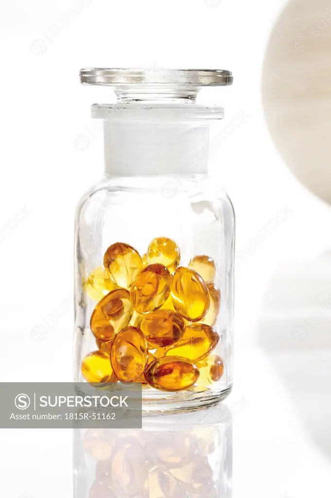 Evening primrose capsules in glass