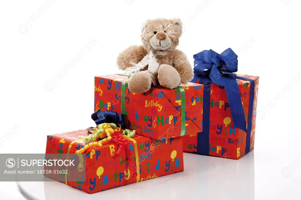 Teddy bear on gift parcels