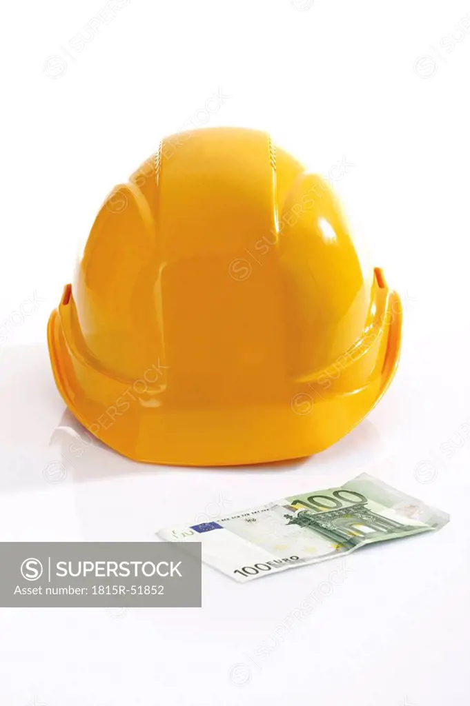 Hardhat and 100 Euro bank note