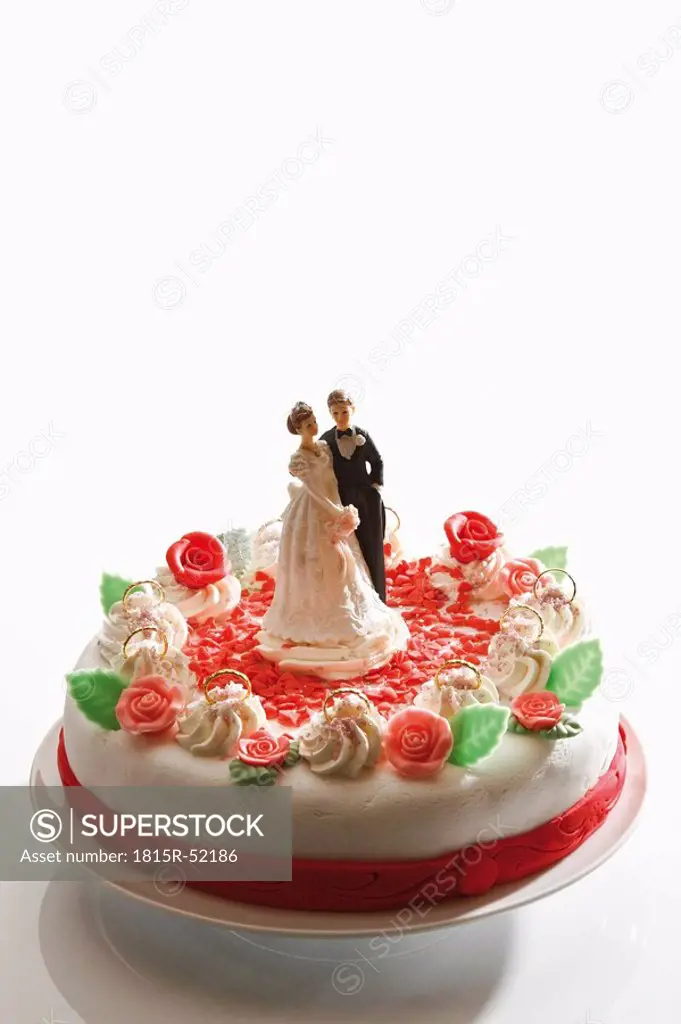 Wedding cake topper with bride and groom, elevated view