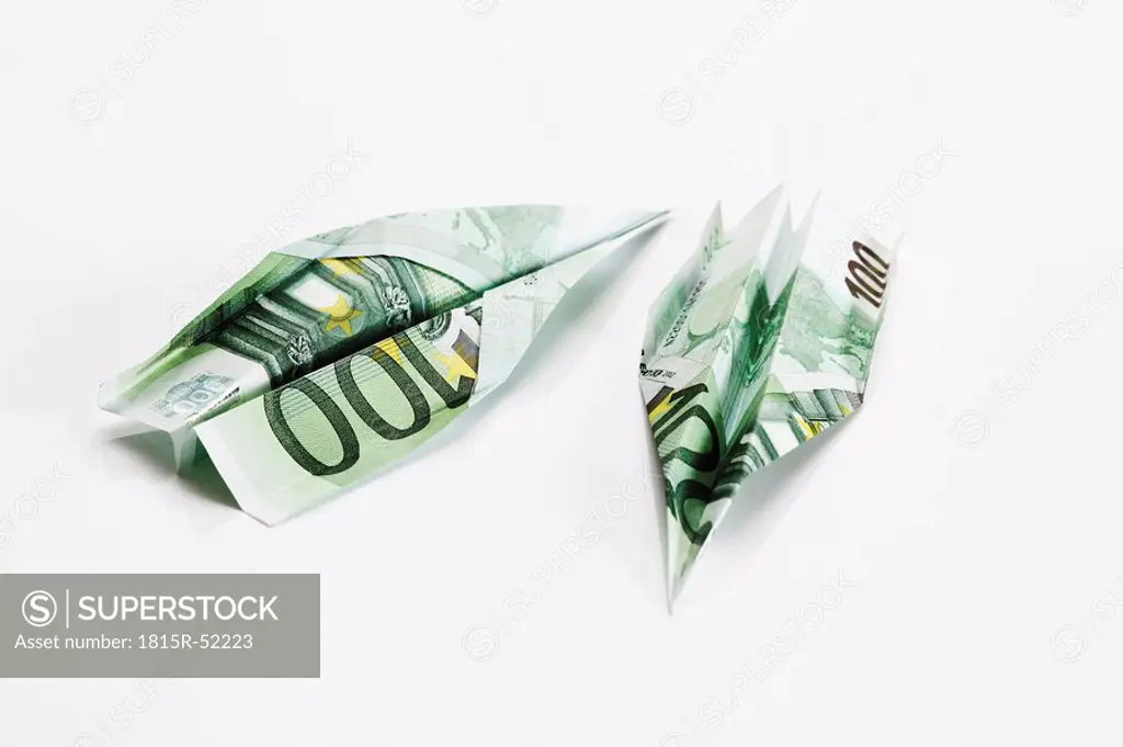 Paper aeroplanes folded from 100 Euro banknotes