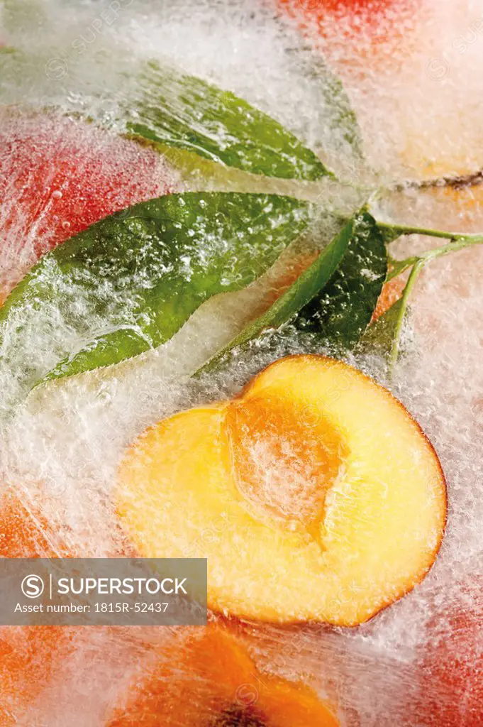 Frozen peaches in a block of ice