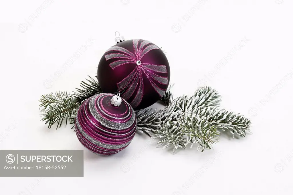 Christmas decoration, Lilac Christmas baubles and fir twig
